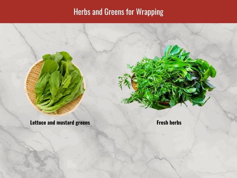 Fresh herbs and greens served with banh khot including lettuce, mustard greens, fish mint, Thai basil, and Vietnamese herbs