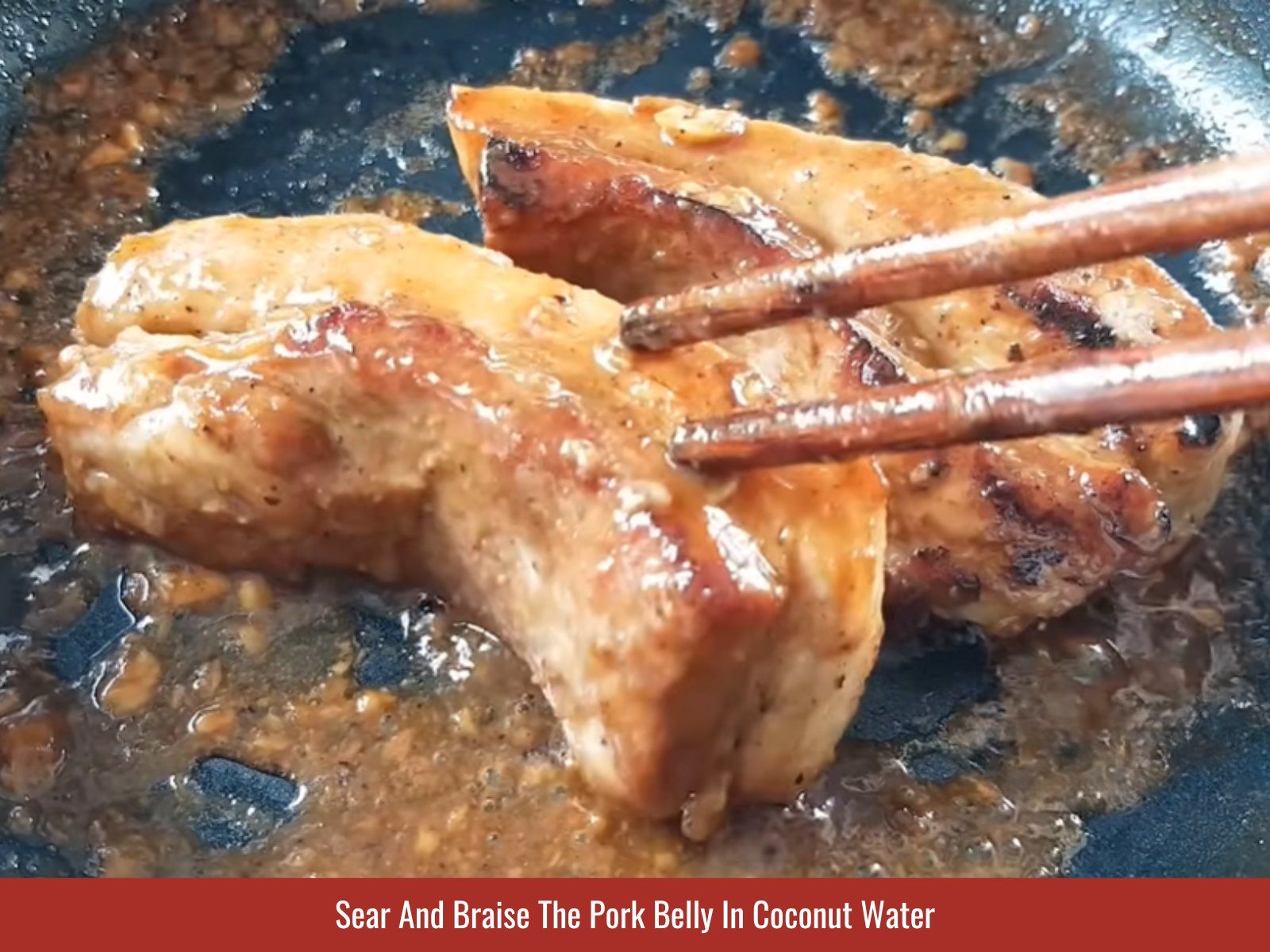 Pork belly braising in coconut water glaze