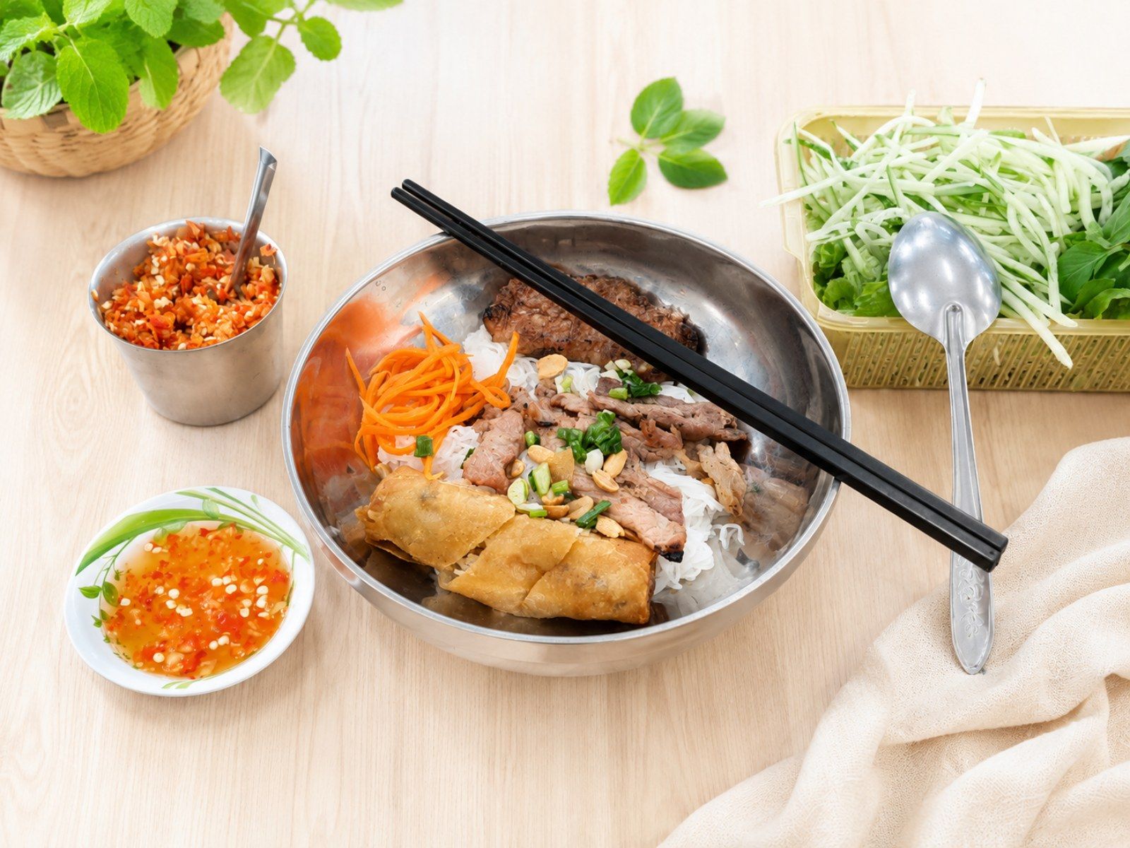 vermicelli bowl with pork and egg roll