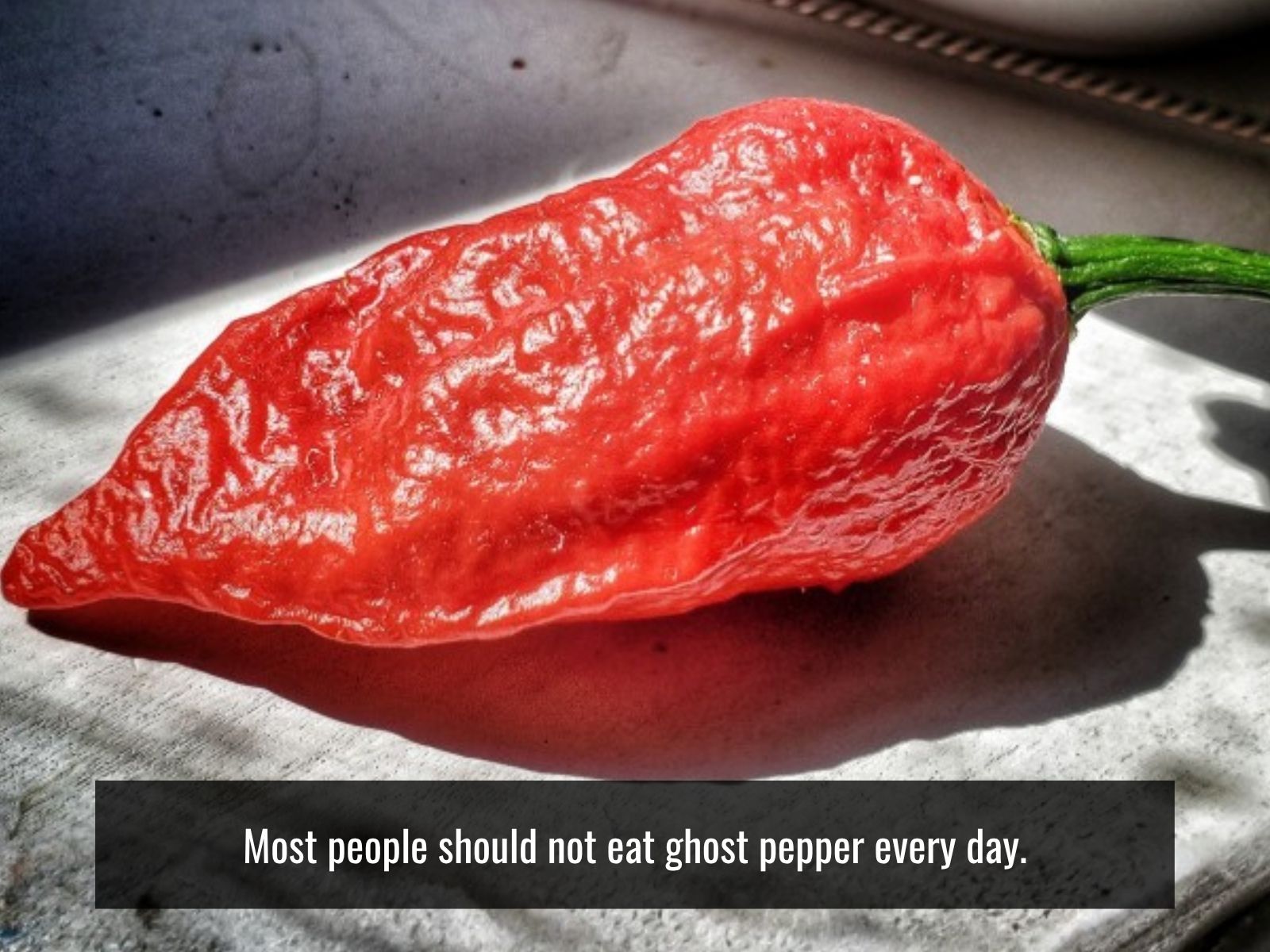 Tiny daily serving of ghost pepper seasoning