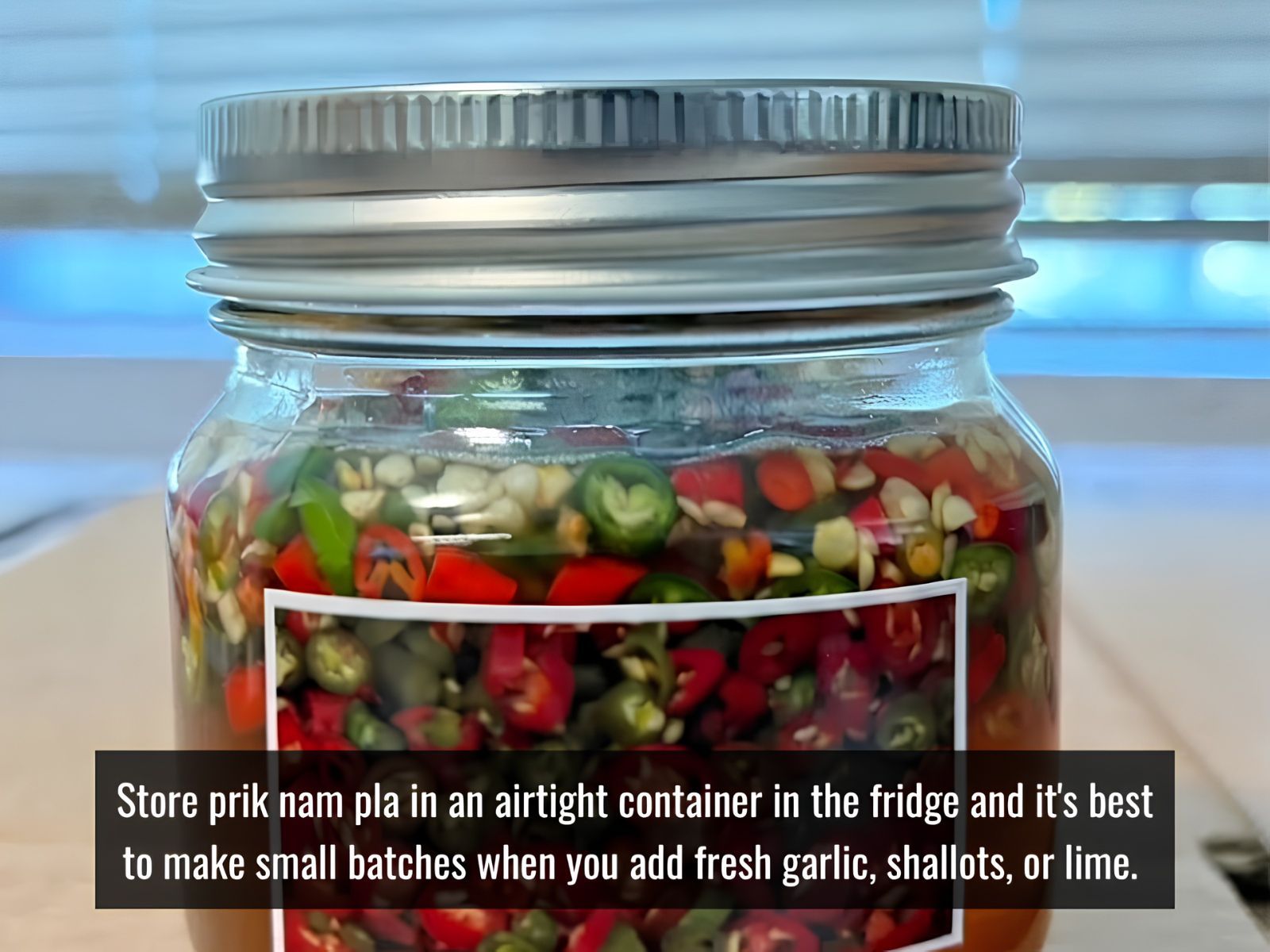 Prik nam pla stored in airtight container in refrigerator