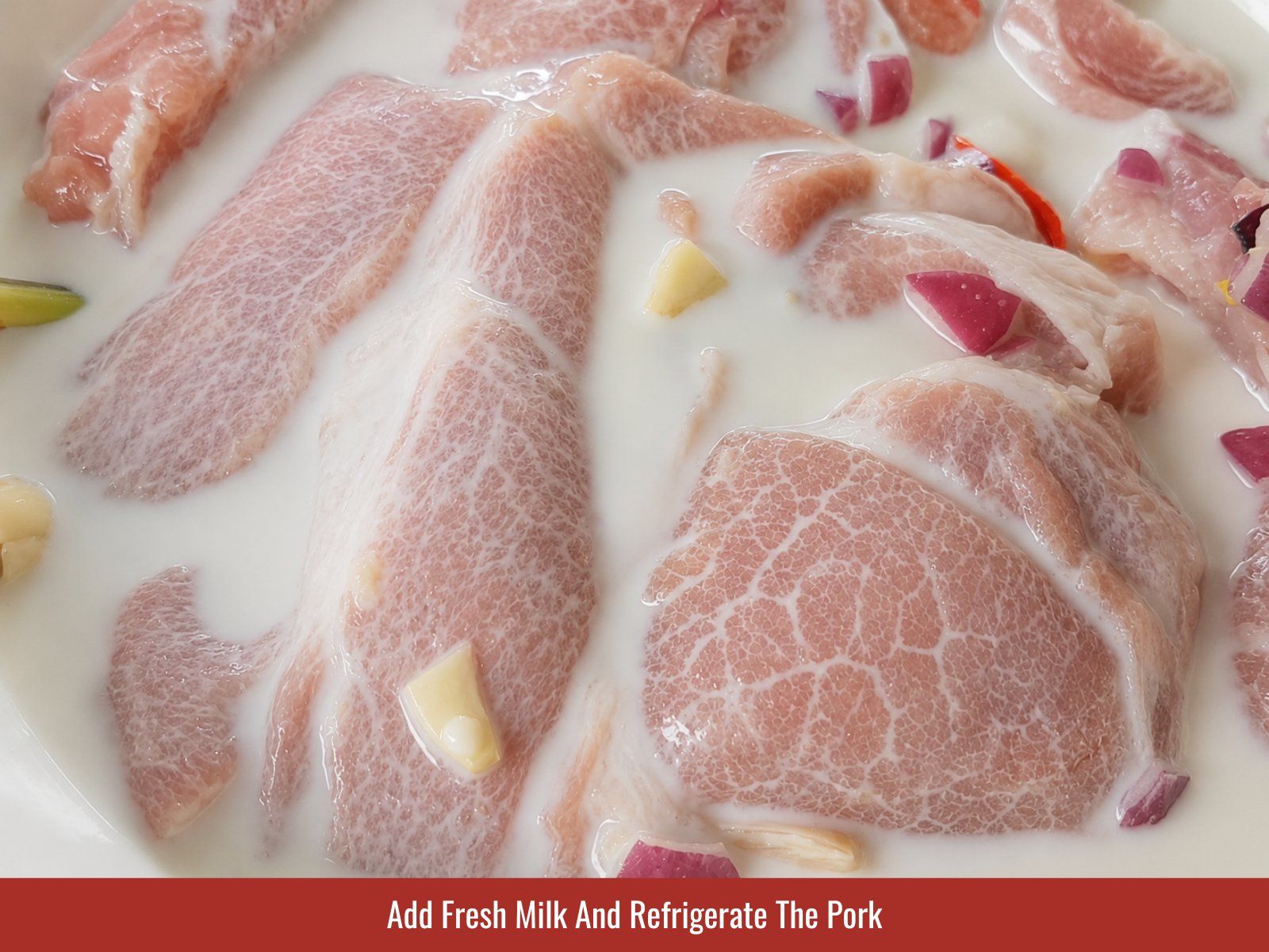 Adding fresh milk to marinated pork chops