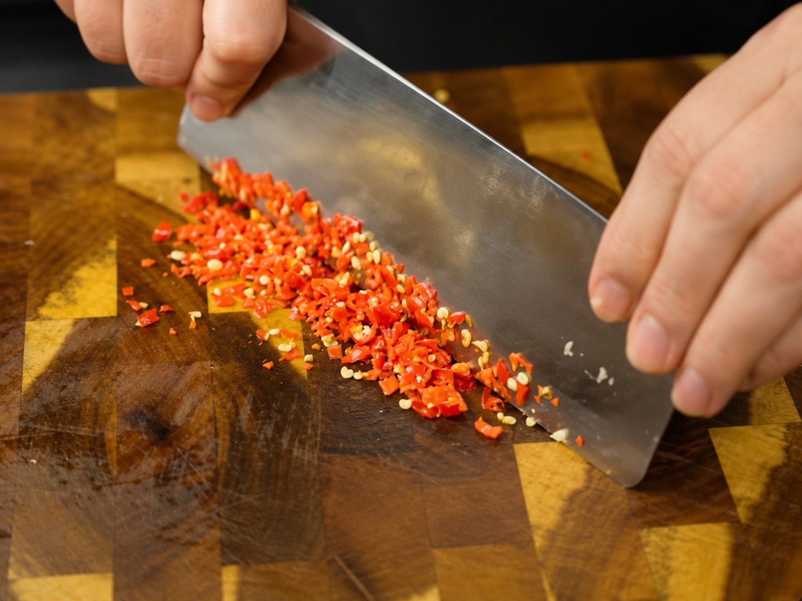 nuoc-cham.jpgMinced celestial chili pepper with seeds removed, prepared for nuoc cham