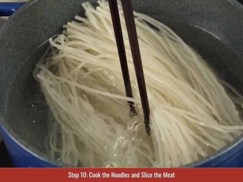 Preparing thick rice noodles and slicing beef, pork hock, and Vietnamese sausage for serving