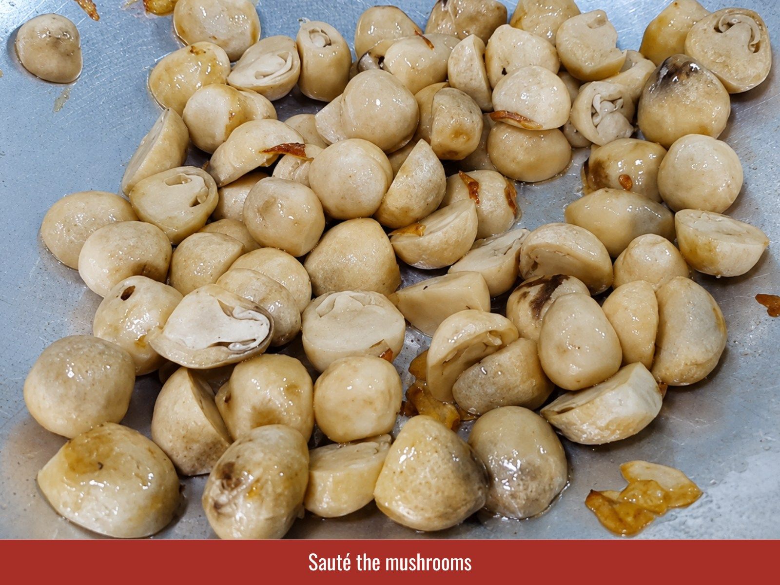 Sauté straw mushrooms