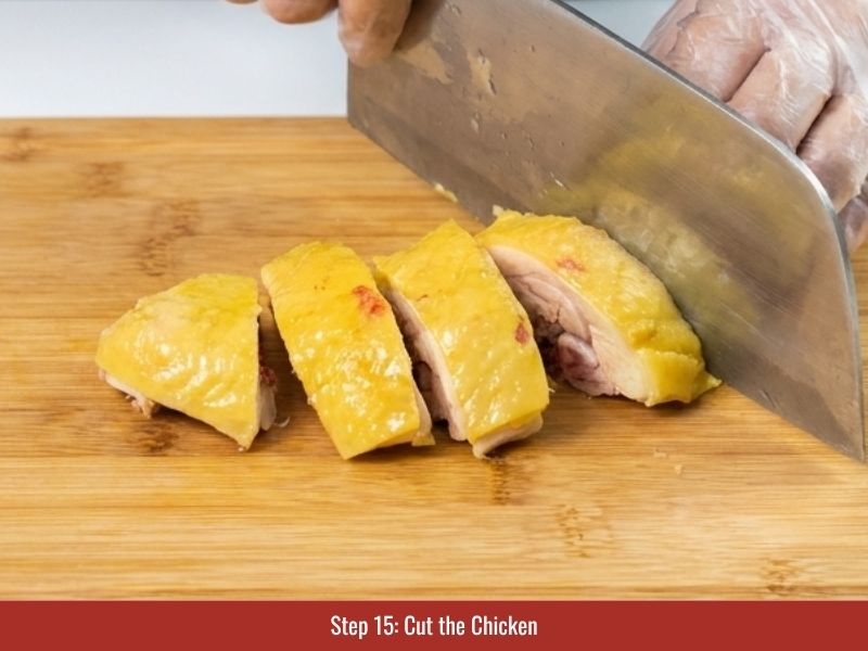 Slicing or shredding cooled chicken into pieces for Vietnamese pho bowls