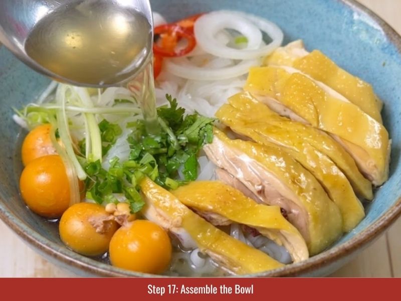 Assembling chicken pho with rice noodles, chicken, clear broth, herbs, and final toppings