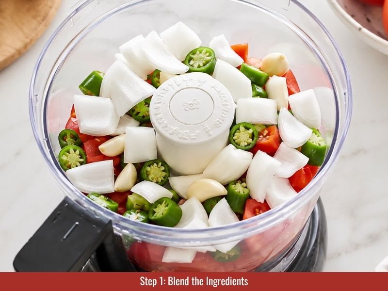 Blend fresh tomatoes, jalapeños, garlic, onion, cilantro, and lime juice