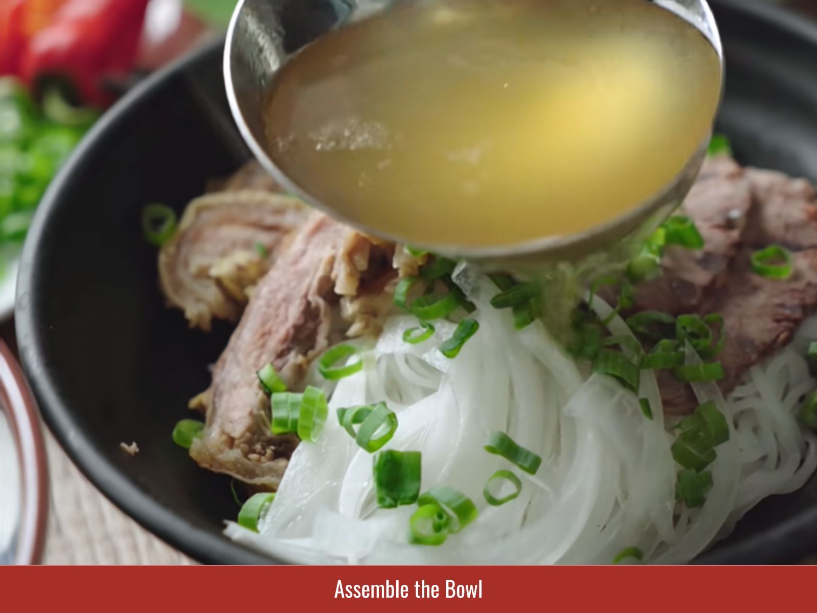Assembling the beef pho bowl