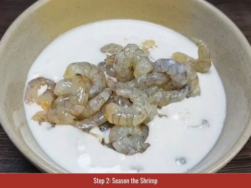 Seasoning shrimp with coconut cream, sugar, salt, pepper, and green onion for banh khot topping