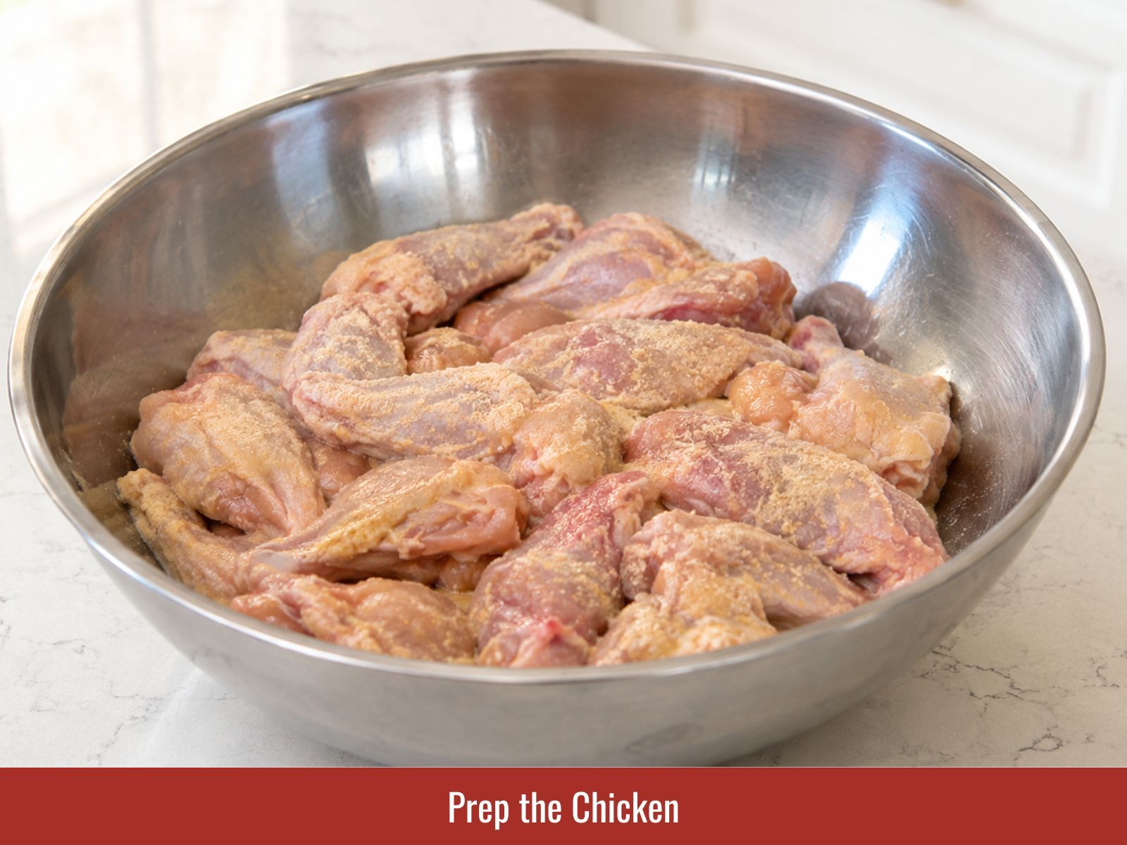 Preparing boneless chicken thighs before adding the fish sauce marinade