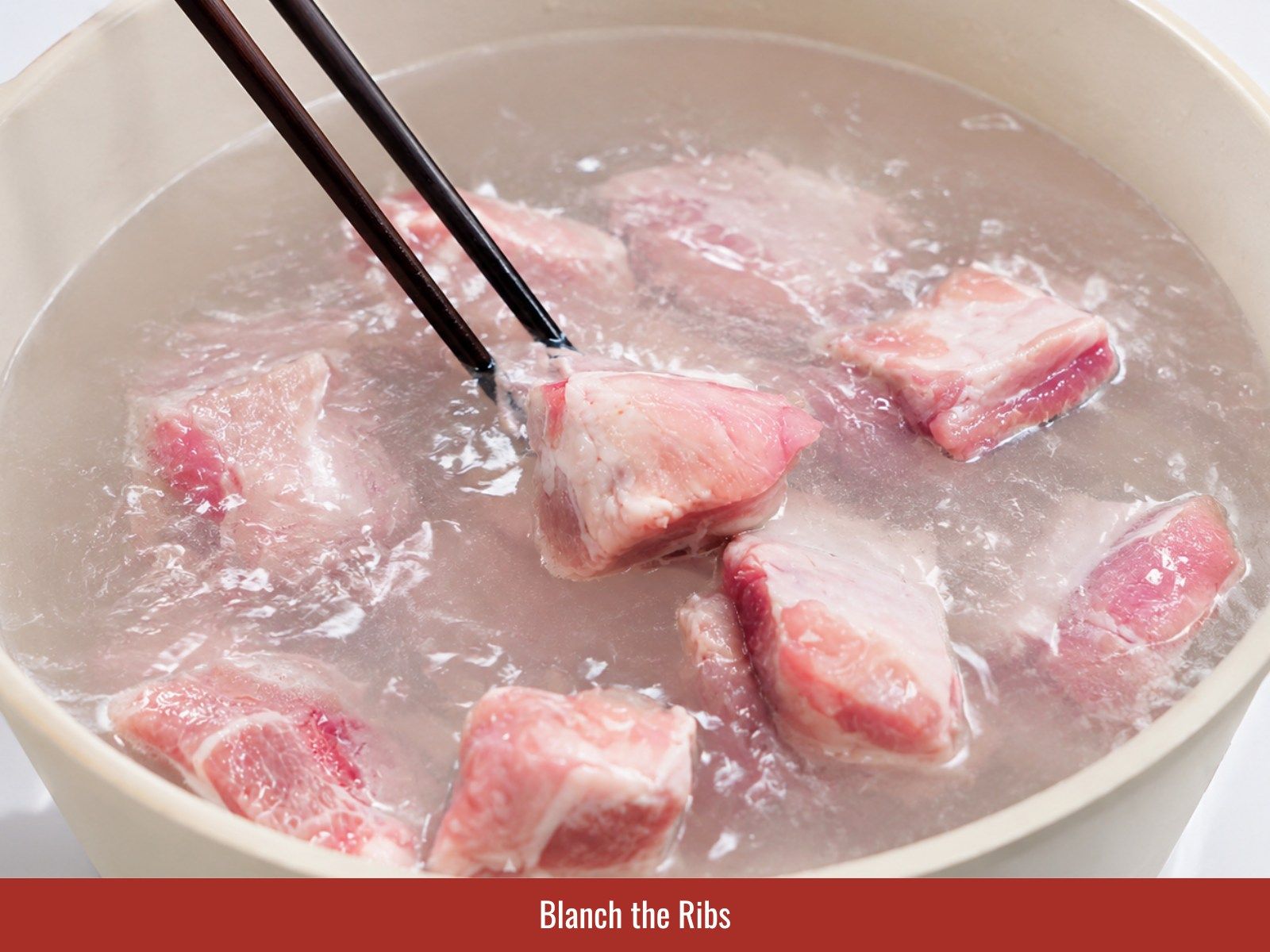 Blanch pork ribs briefly