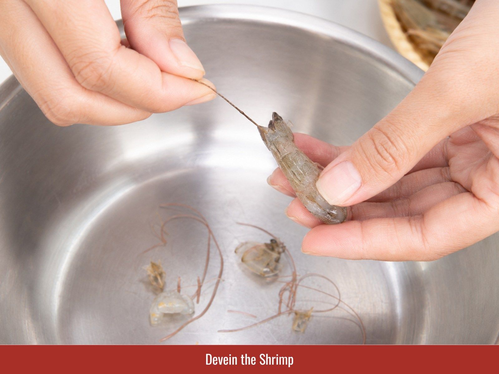 Devein shrimp while keeping shells intact