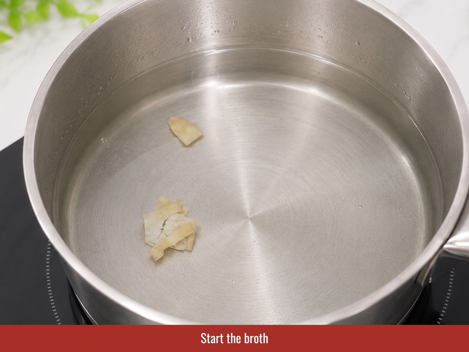 Simmer pork ribs to build broth