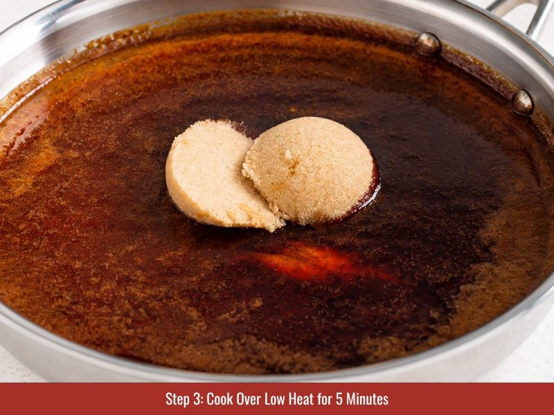 Cook Nashville hot sauce over low heat while whisking