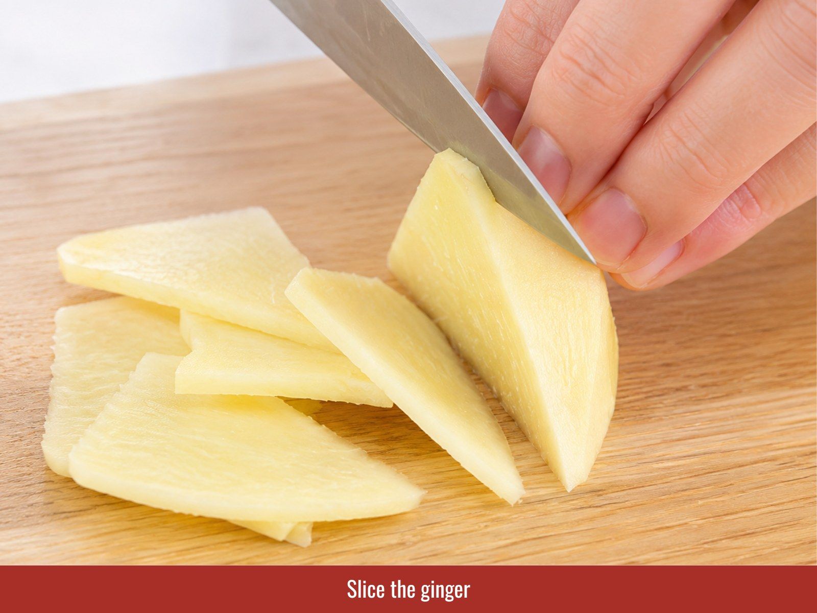 Slice fresh ginger for chicken