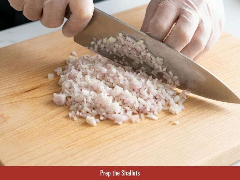 Preparing minced shallots before frying crispy toppings for Vietnamese steamed rice sheets