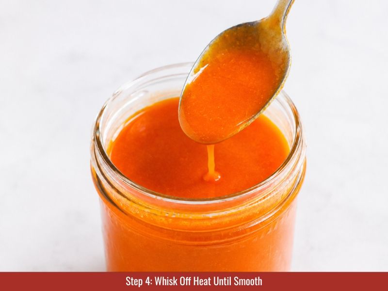 Buffalo sauce whisked off heat until glossy