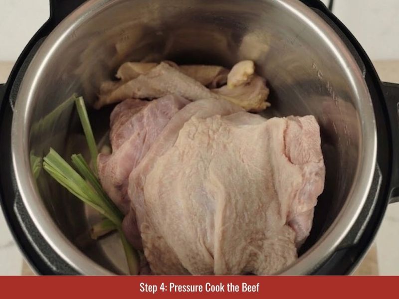Pressure cooking beef shank and beef plate with aromatics to create tender bun bo Hue meat