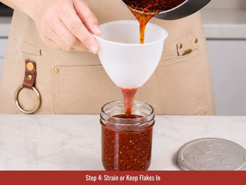 Straining hot honey sauce until smooth