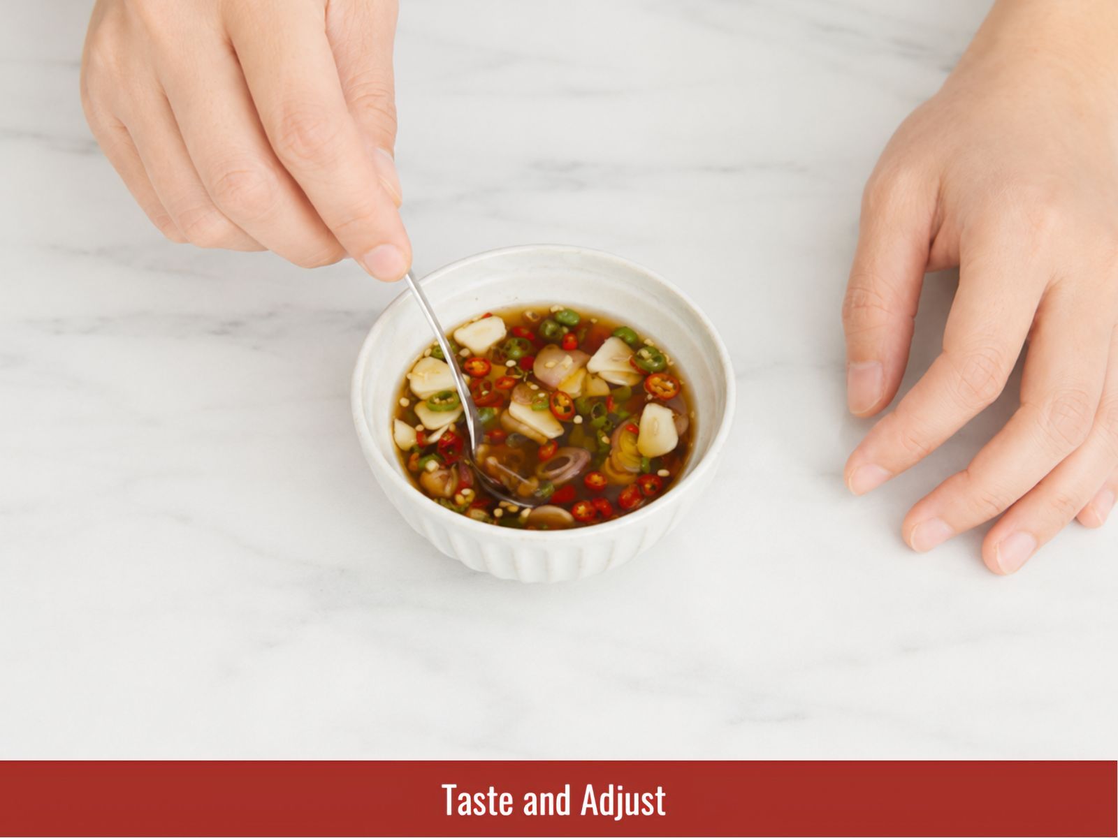 Tasting prik nam pla and adjusting heat salt and acidity
