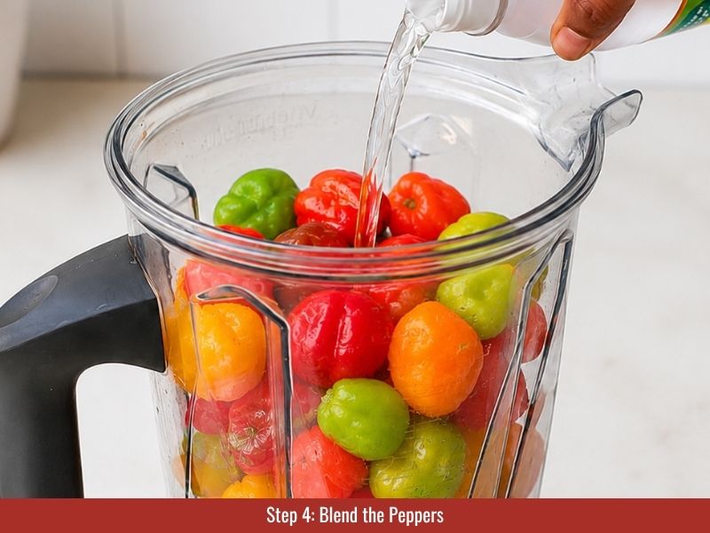 Blend scotch bonnet peppers with vinegar