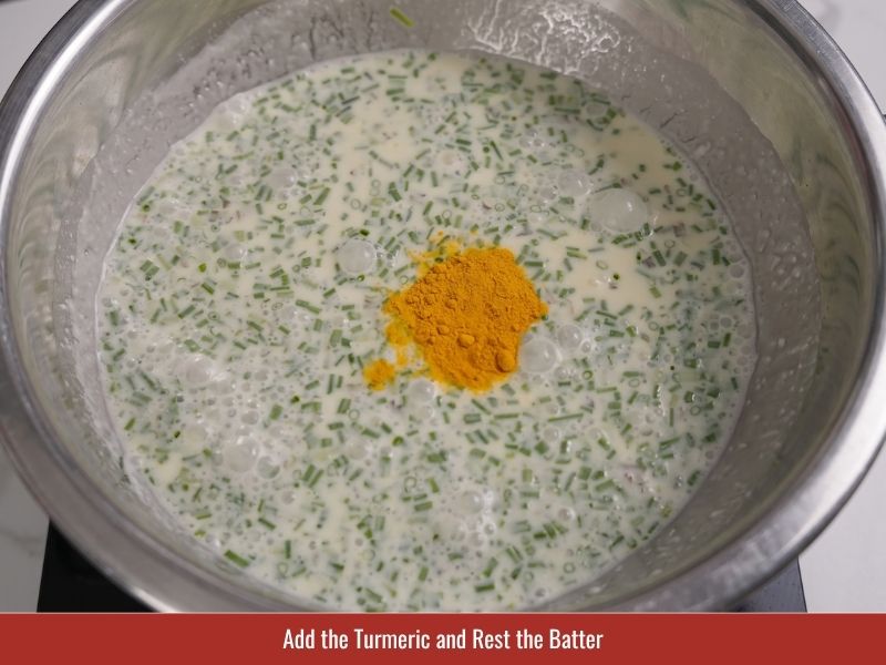 Resting thin banh xeo batter before cooking to improve texture and crispness