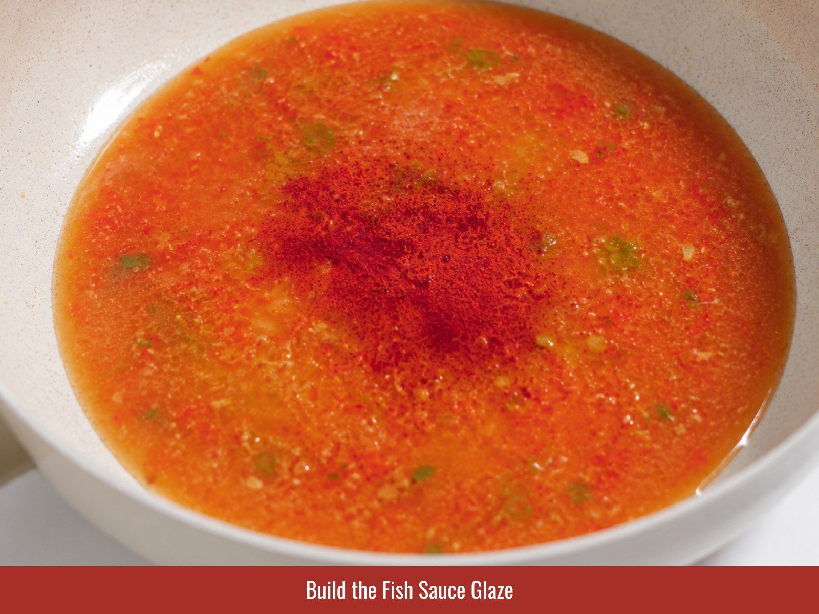 Simmer fish sauce glaze with aromatics