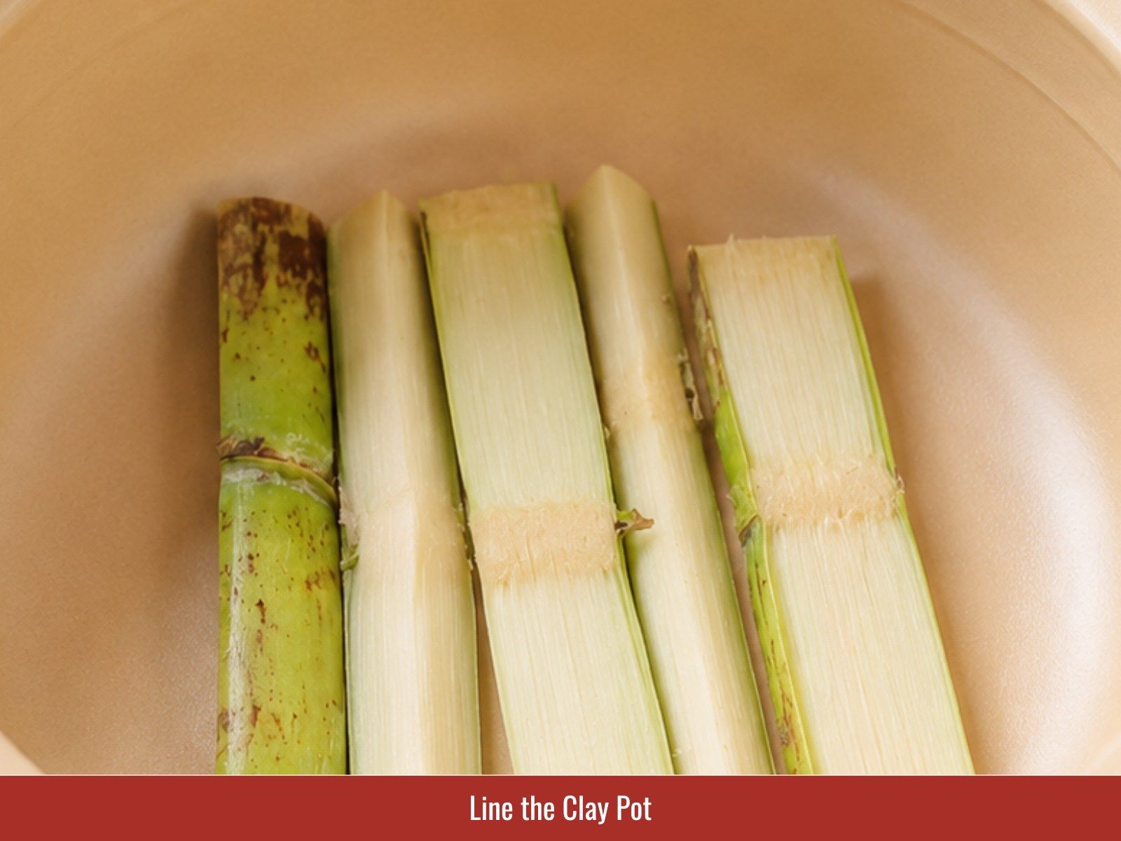 Line clay pot with sugarcane or onion