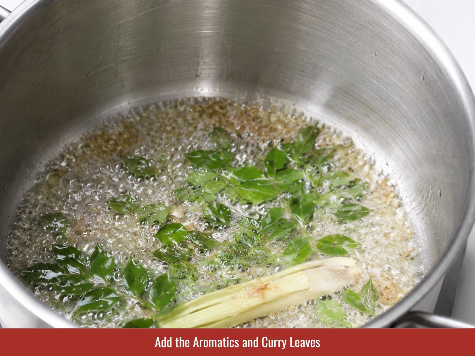 Cook garlic shallots and curry leaves
