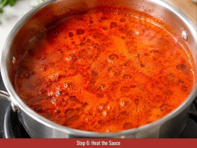 Heat Thai chili hot sauce to pasteurize