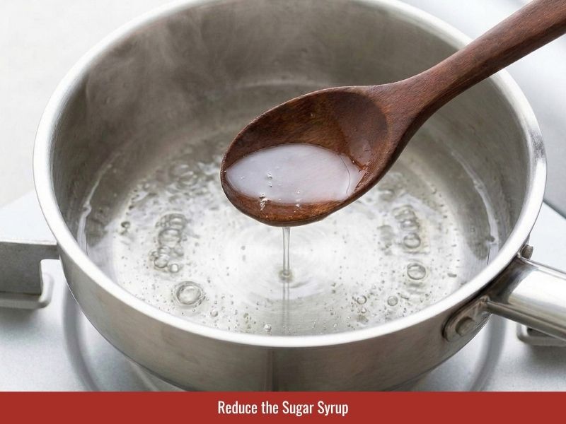 Simmering sugar syrup with water and salt as the base for banh uot dipping sauce