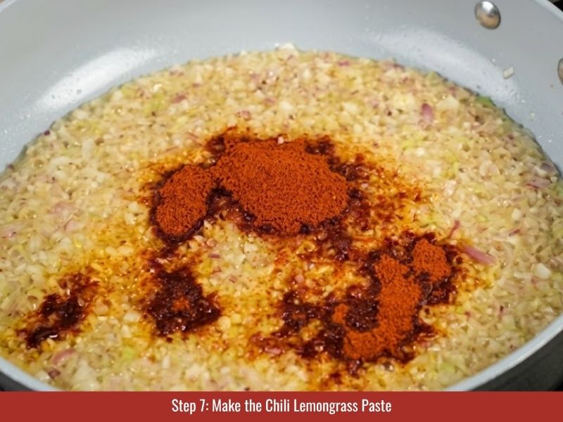 Cooking bun bo Hue sa te with lemongrass, garlic, shallots, chili, and annatto oil