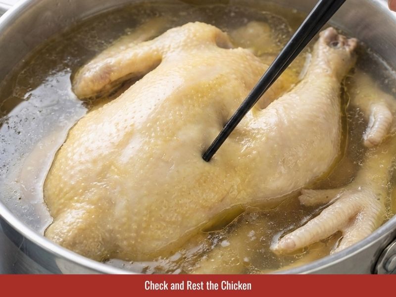 Checking cooked chicken texture and resting the chicken in hot broth before shredding