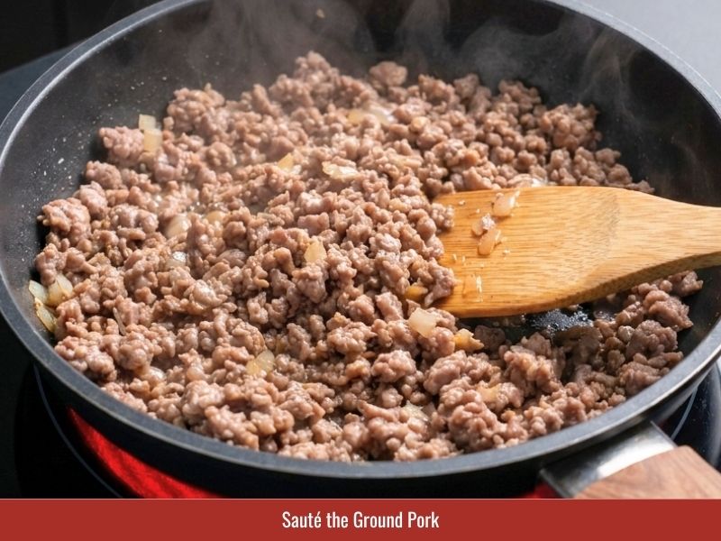 Cooking seasoned ground pork topping for Vietnamese macaroni soup