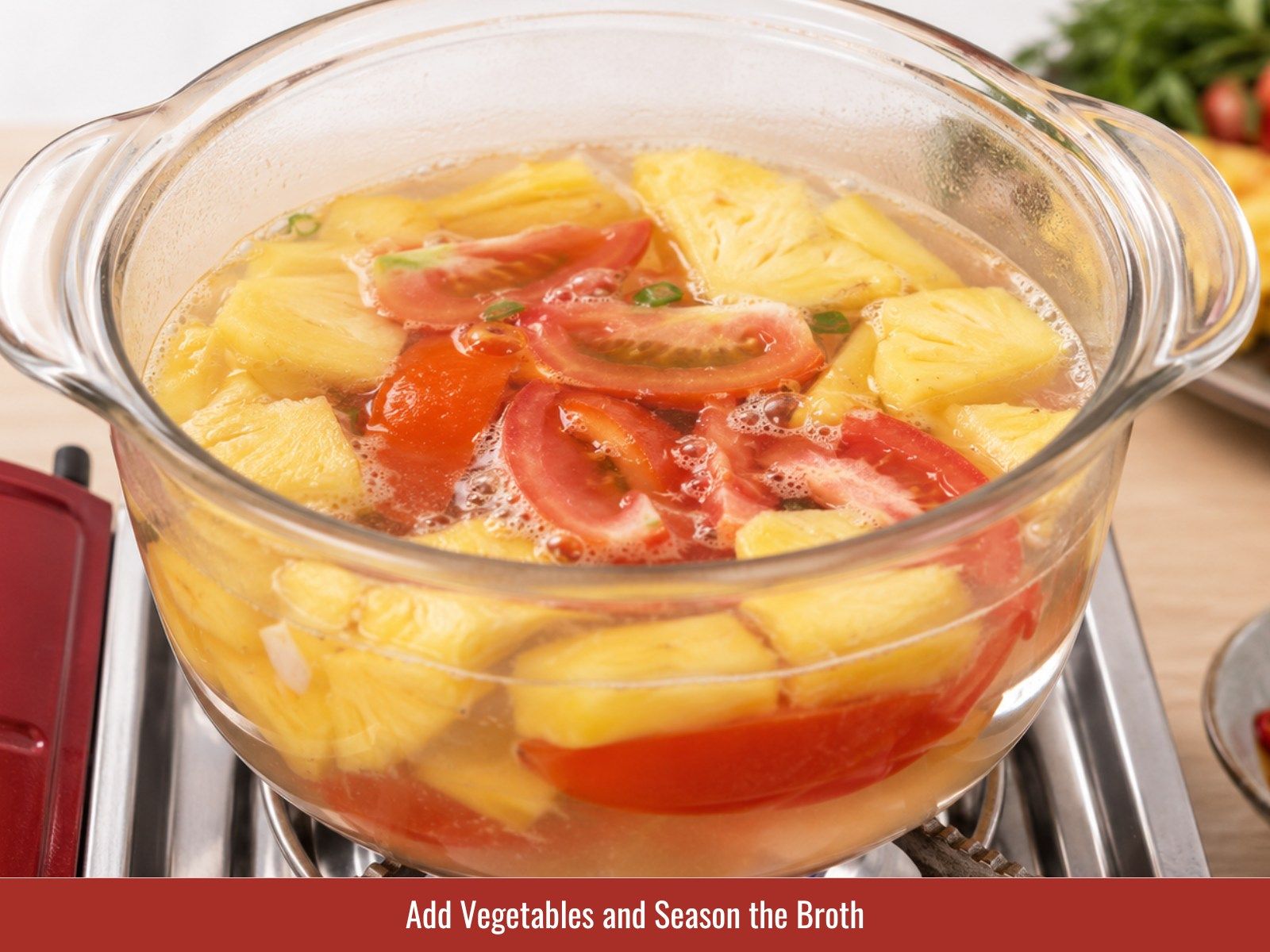 Add pineapple, okra, tomatoes, and seasonings to broth