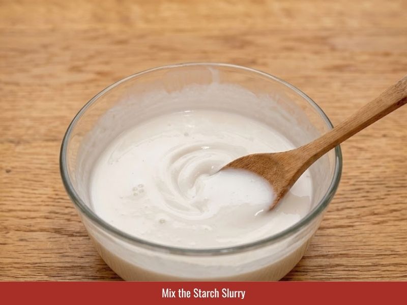 Mixing potato starch and water to prepare the thickener for silky soup texture