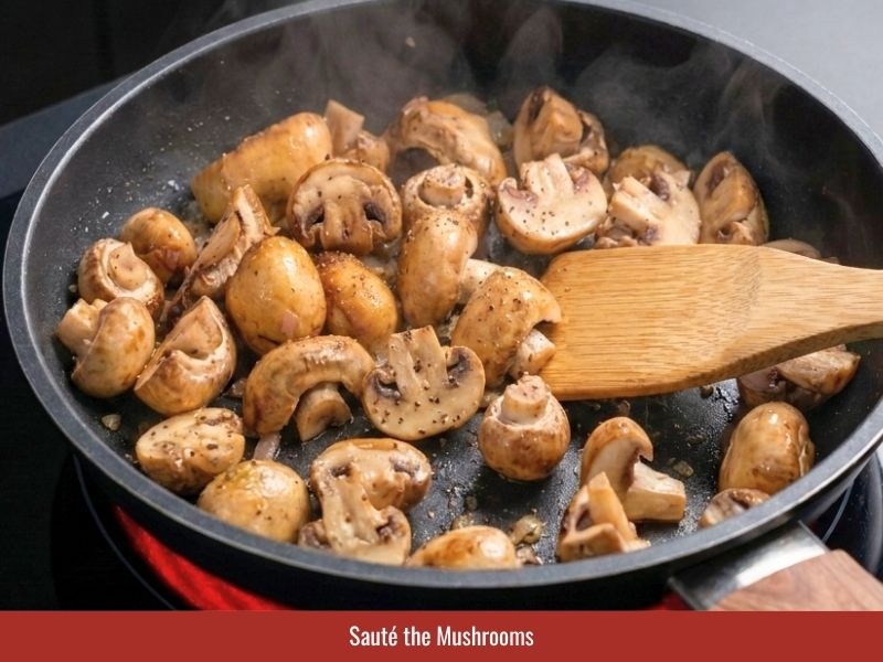 Cooking mushrooms with aromatics to add savory flavor to sup nui