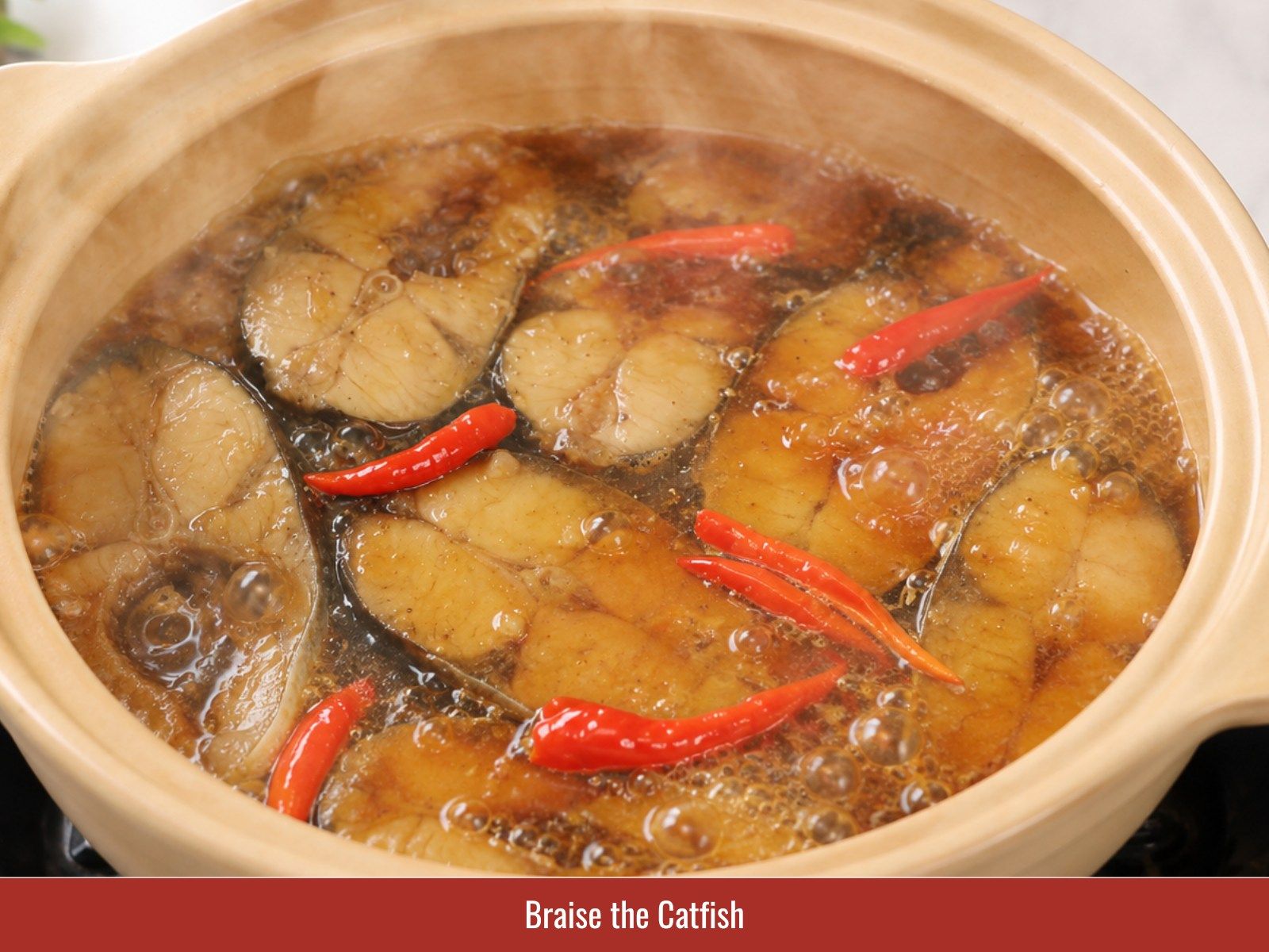 Slowly braise catfish in sauce
