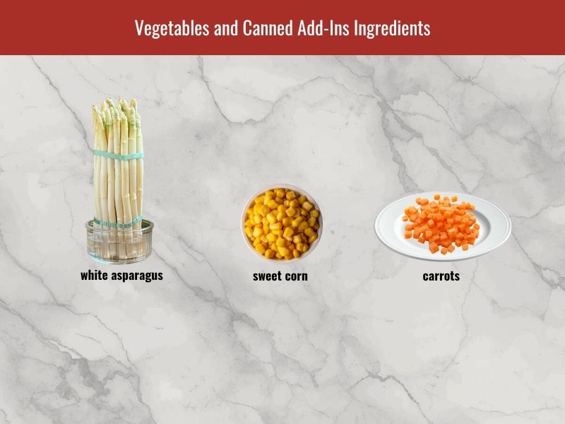 Sup mang cua ingredients including white asparagus, corn, carrots, and vegetables for texture and sweetness