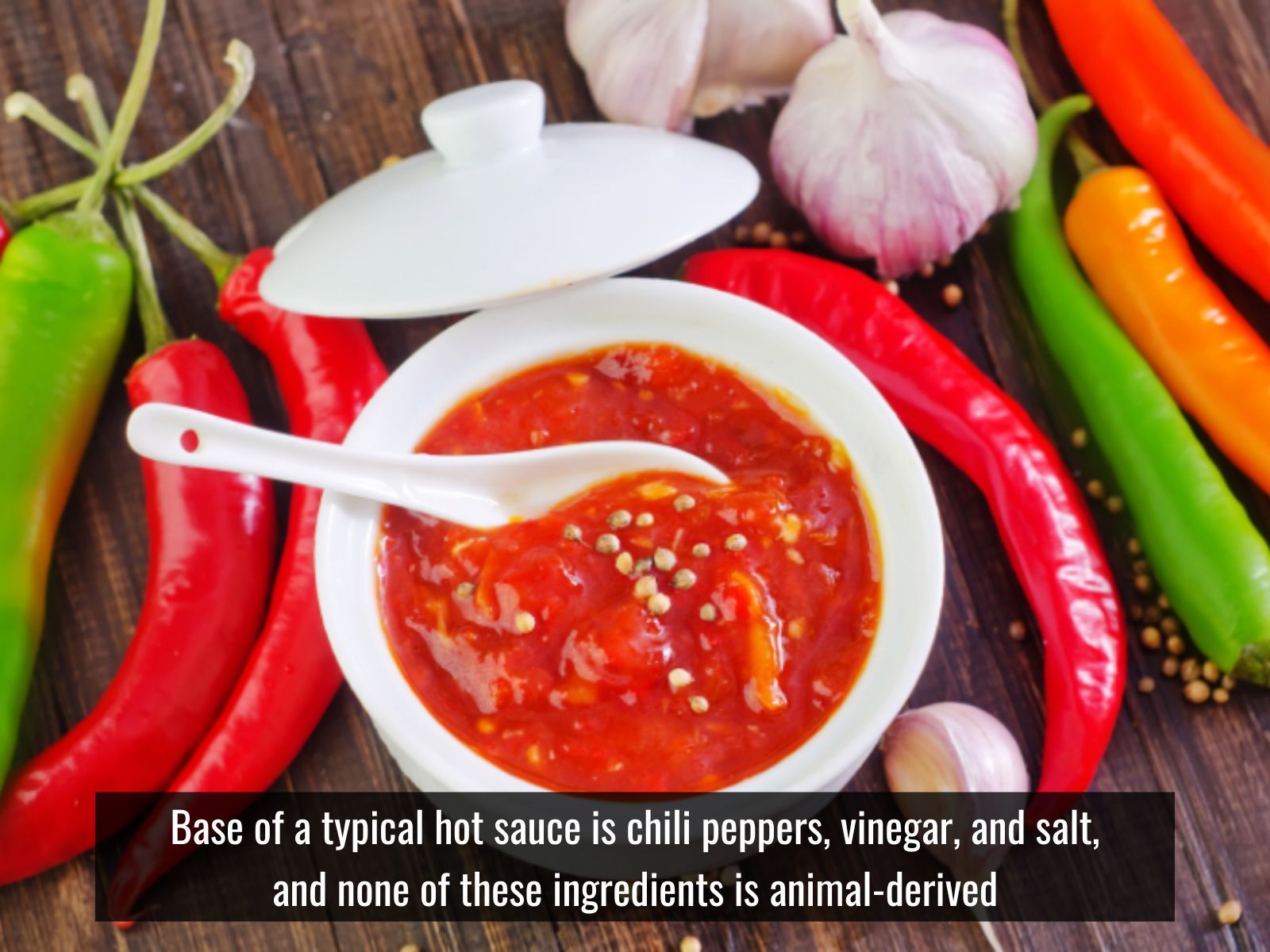 Typical vegan hot sauce ingredients with chili peppers and garlic